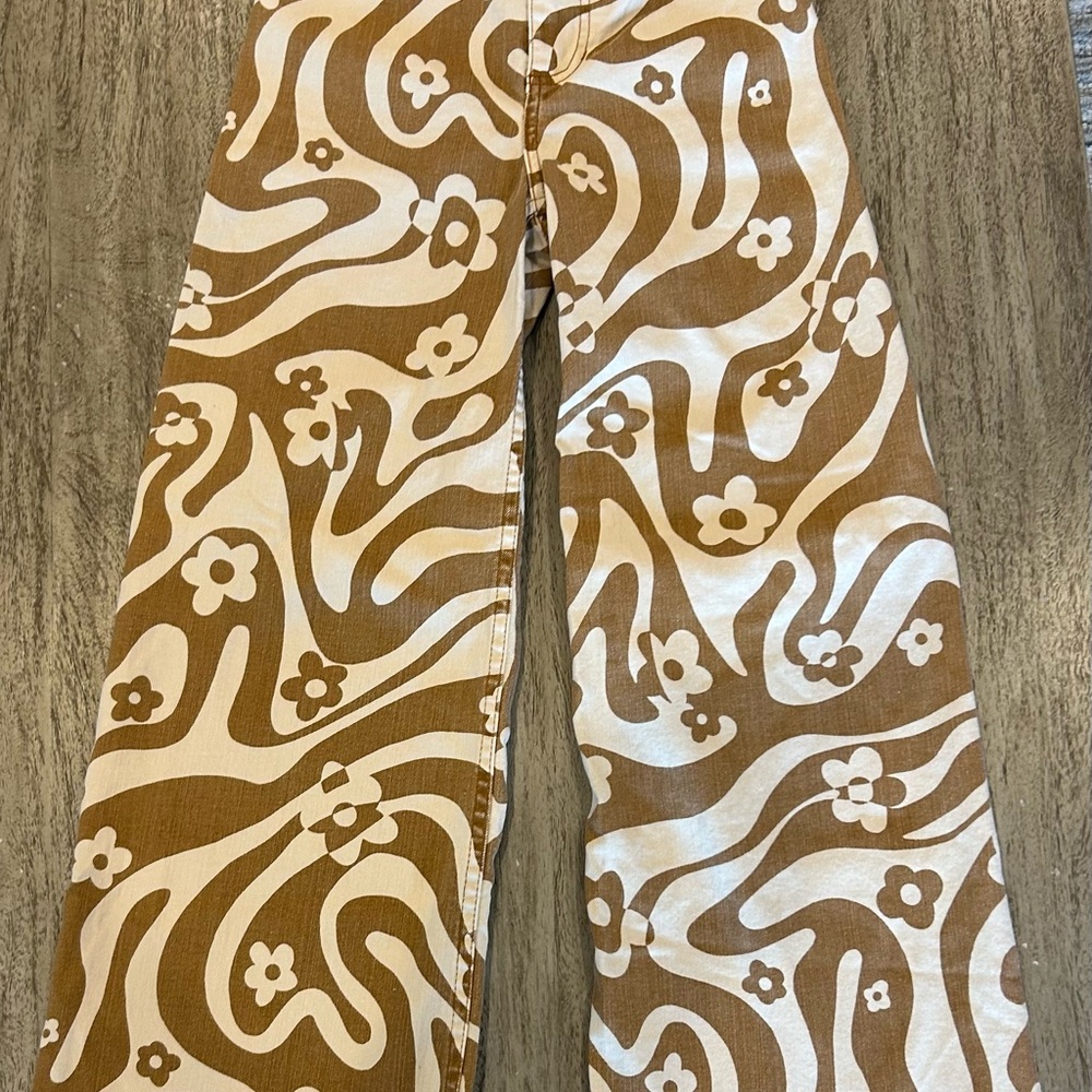 Billabong Brown and Cream Flare Jeans with Psychedelic Pattern